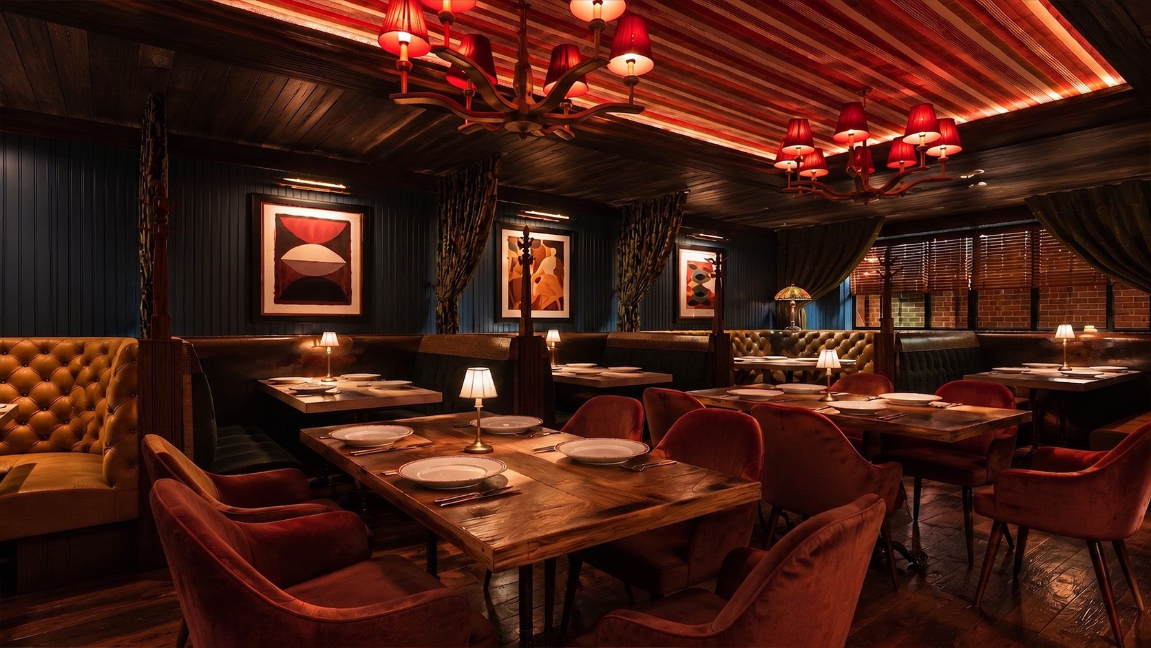 Design concept: low red light, velvet chairs and banquettes