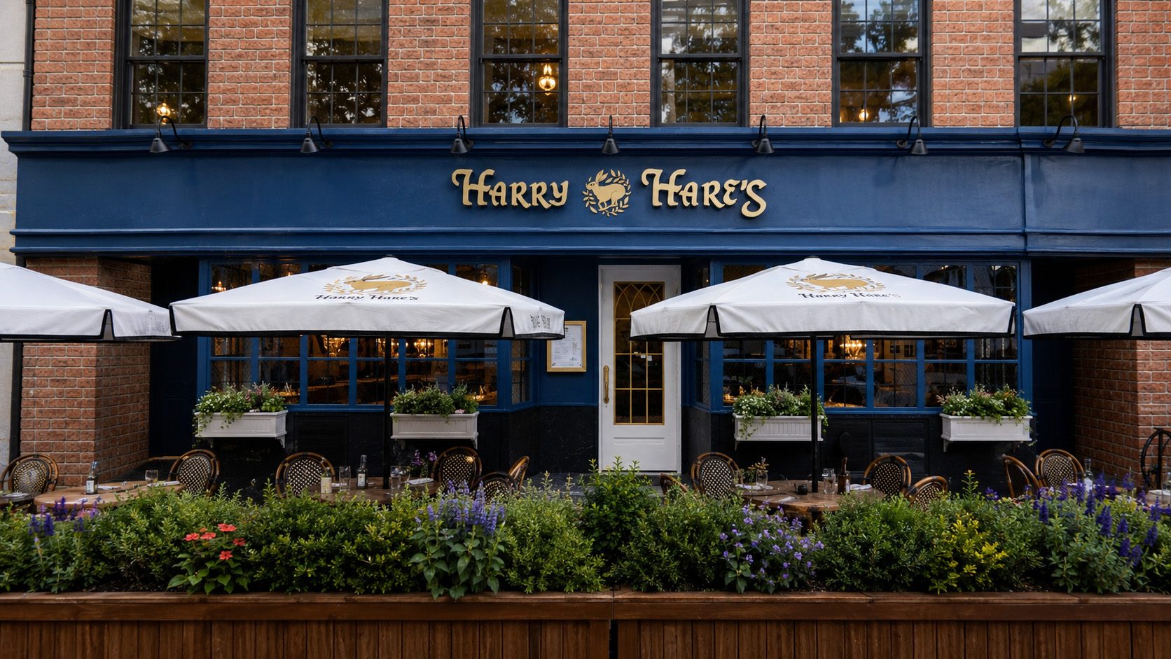 Design concept: the storefront with branded umbrellas over patio tables